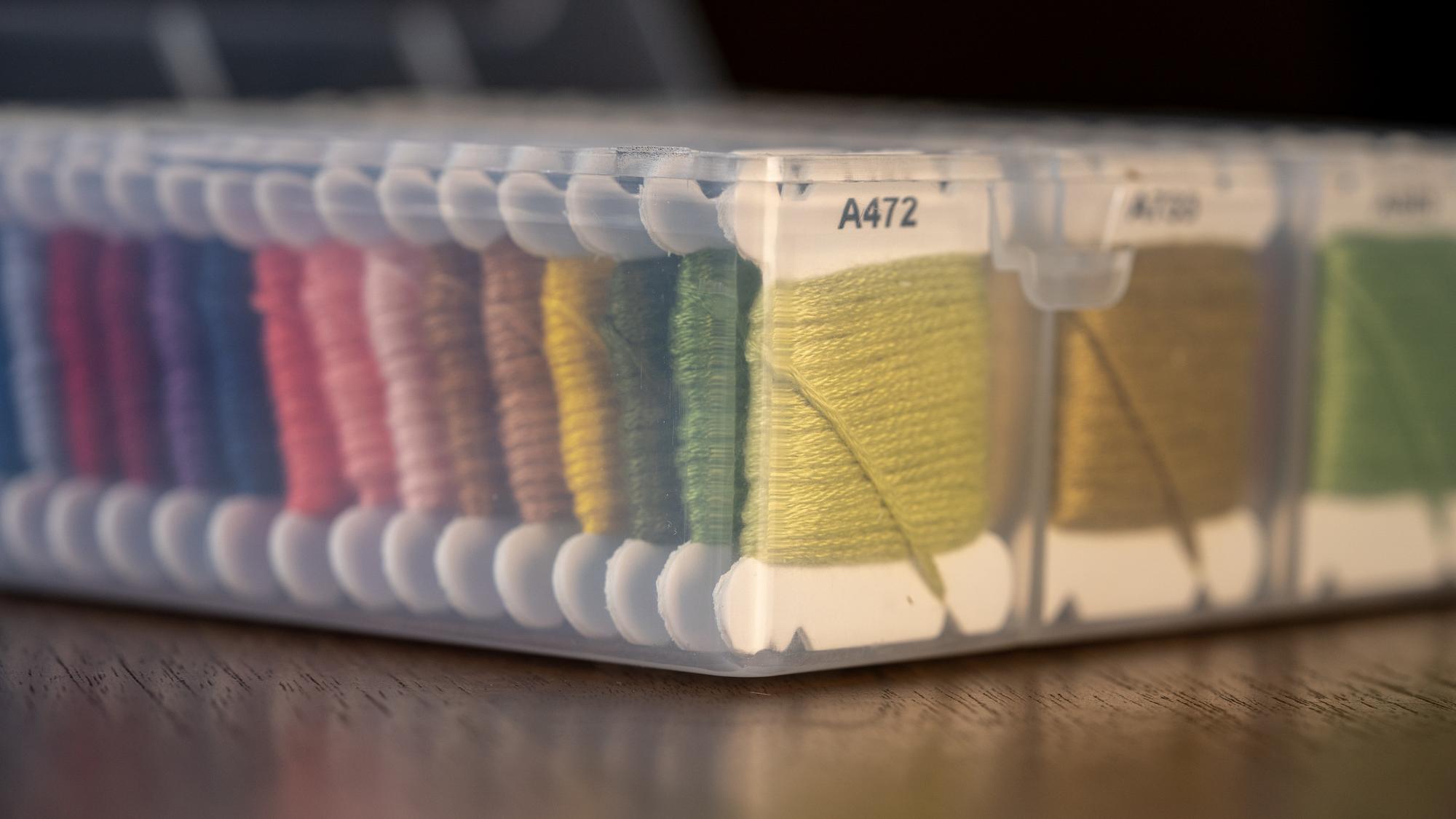 Stack of embroidered samples and labels